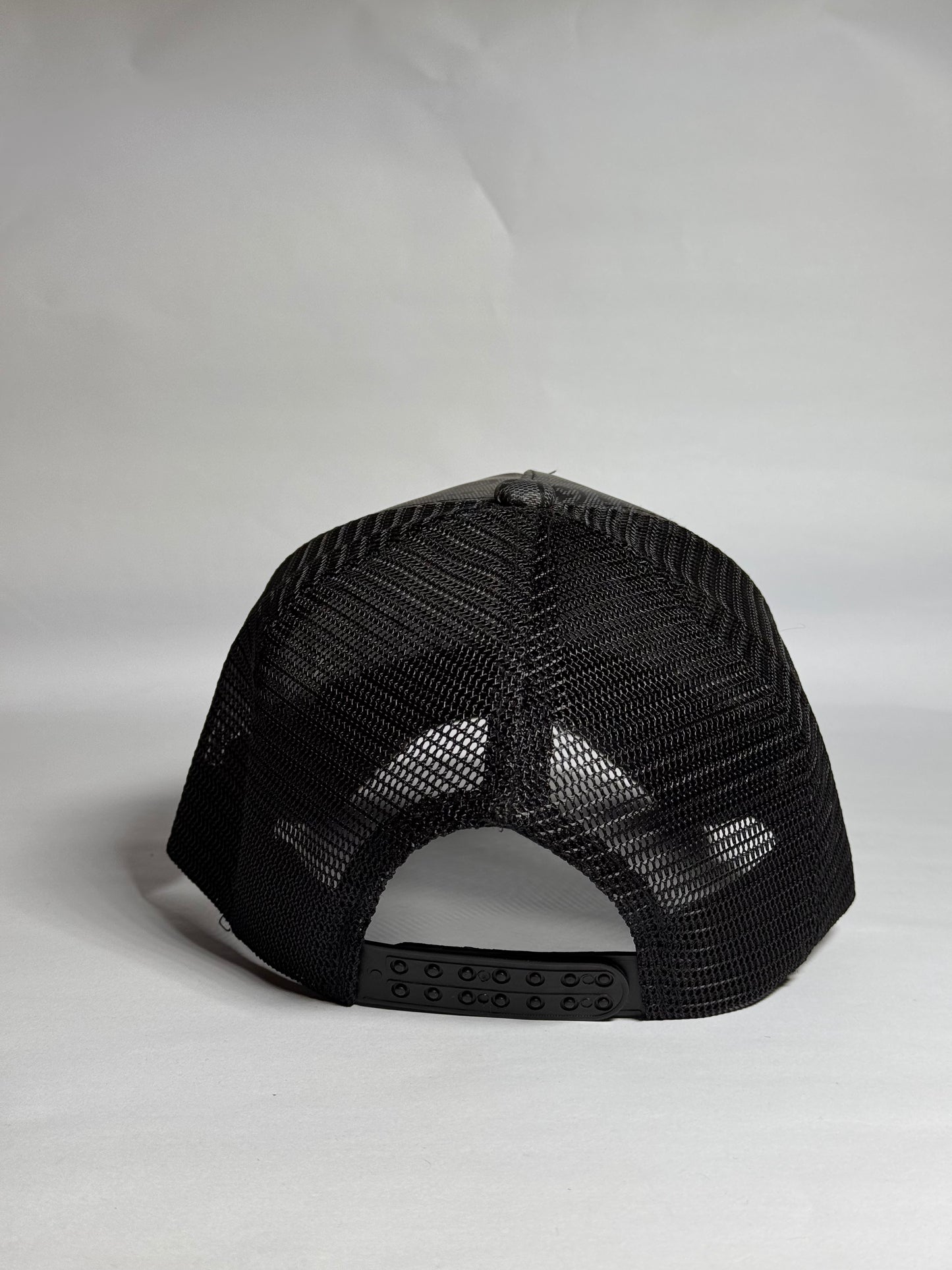 Elite Signature Black Trucker Cap