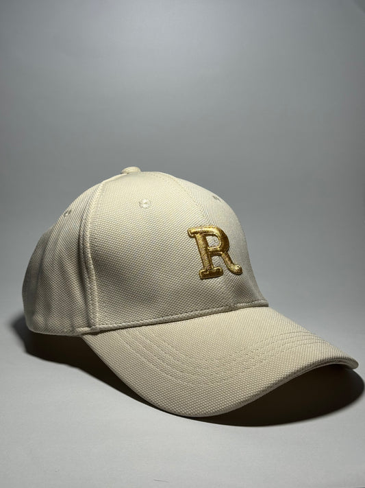Beige Baseball Cap with Gold Embroidered 'R'